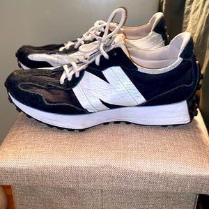 New balance, black and white shoes, worn but still have some life in them